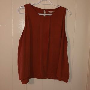 Orange sleeveless blouse